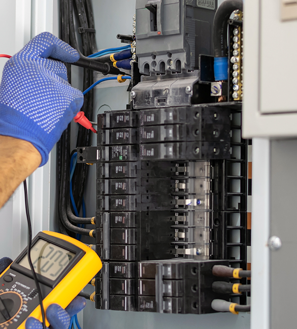 Residential Low Voltage panel being checked by electrician